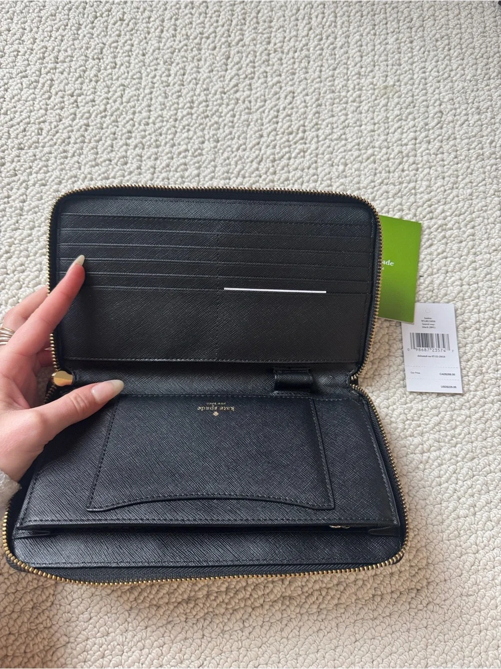 kate spade Black Zip-Around Continental Wallet with Gold Logo